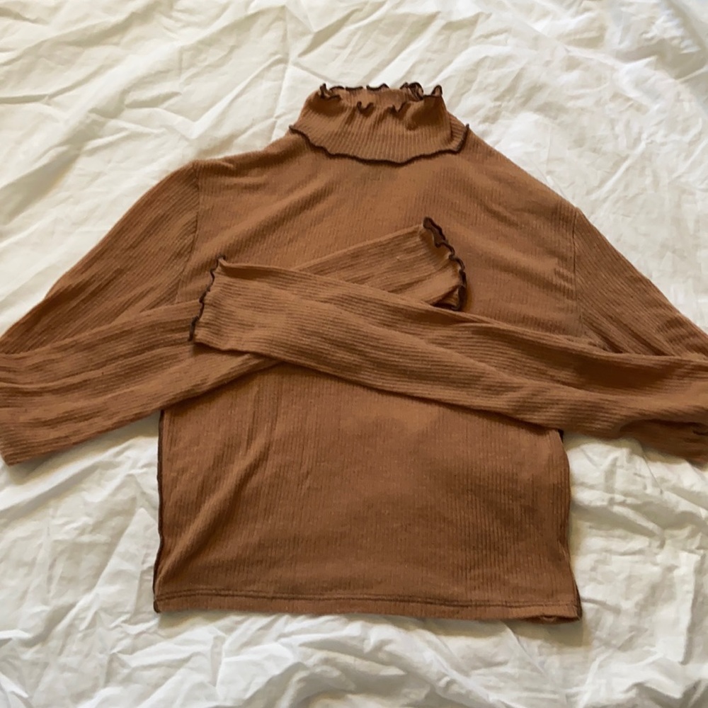 Light brown ribbed lettuce lined turtleneck